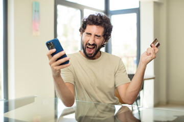 Sticker - bearded hispanic man shopping with a credit card