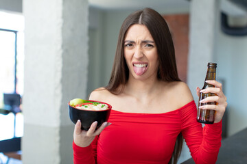 Poster - hispanic pretty woman with an asian noodles bowl