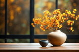 Fototapeta Kwiaty - Empty wooden table the background of a window with a beautiful autumn foliage background. colorful leaves, one bowl filled with cranberries vase with yellow mums, ready for product montage, mockup