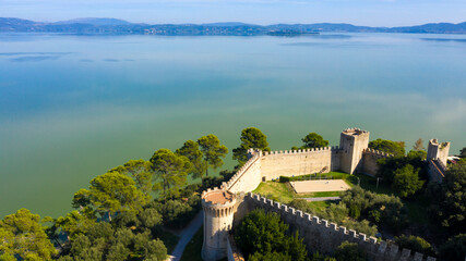 Aerial view on Fortress of the Lion in historical center of Castiglione del Lago, in Umbria, Italy. The castle is now used for events and is located on Lake Trasimeno in the province of Perugia.