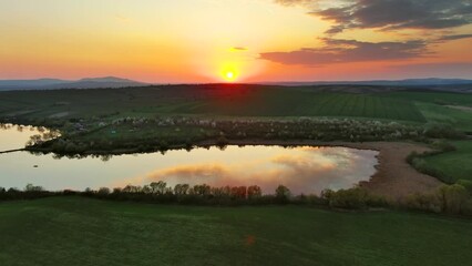 Sticker - Aerial view of amazing wavy hills and pond at sunset. South Moravia region, Czech Republic, Europe, 4k
