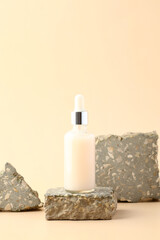 Wall Mural - dropper bottle with white serum liquid on stone pedestal