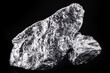 chrome stone extracted from mine, isolated black background.