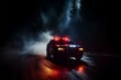 In the dark and misty night, a police car gives chase