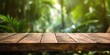 The empty rustic wooden table for product display with blur background of tropical jungle. Generative AI image AIG30.