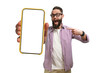 Young crazy bearded charismatic hipster showing big empty white smartphone screen for copy space and advertising area. Mobile App Advertisement. Display Mock Up