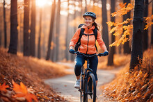 smiling woman riding a bicycle in the forest in autumn at sunset, lifestyle concept, generative ai
