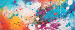 Closeup of inksplattered handmade paper The surface of this paper is adorned with colorful splotches, giving it an artistic and playful appearance. Its absorbent nature makes it ideal for