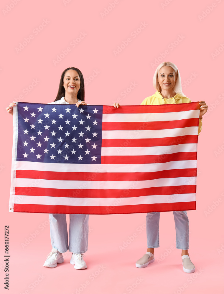 Beautiful women with USA flag on pink background