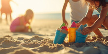 Kids Playing At The Beach In The Sand And Water, Building Sand Castles, With Short Aperture Focus — Children's Portrait With Sunshine And Holiday Vibes