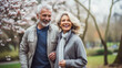 © PaulShlykov - Happy senior couple in autumn park