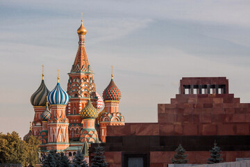 MOSCOW, RUSSIA - SEPTEMBER 26, 2023: St. Basil's Cathedral on Vasilievsky Descent on Red Square on a sunny autumn evening against a bright blue sky. A popular tourist attraction in Moscow.