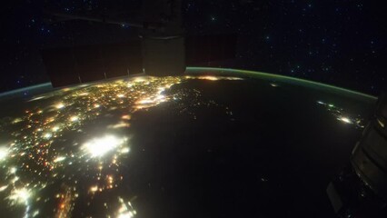 Wall Mural - orbiting over planet earth at night. ciiy lights illuminations seen from above. beautiful planet ear