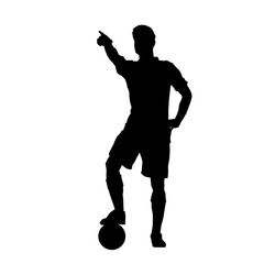 Wall Mural - Silhouette of a football player in standing pose. Silhouette of a soccer sport athlete in pose.