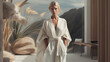 © MYKHAILO KUSHEI - a beautiful slender blonde in a white silk robe in a spa-like room