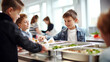 © l1gend - Students being served meal in school canteen