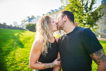 Sticker - Beautiful couple having fun outdoors on urban background