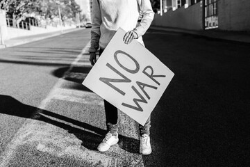 Stop war protest - People on street fighting for peace and human rights - Black and white editing