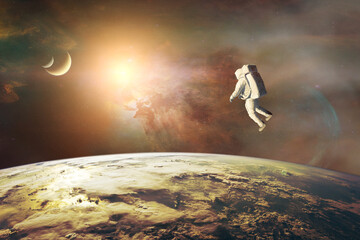 Wall Mural - spaceman on low-orbit of earth planet. elements of this image furnished by nasa.