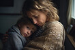 © Kien - Sad little child, hugging his mother at home, mother protection from danger