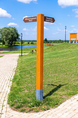 Canvas Print - Direction indicator at the Nativity Bobrenev convent in Kolomna, Russia. Text in russian: Monastery pond, Bobrenev monastery