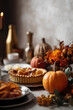 © tynza - Traditional American pumpkin pie on festive table decorated for Thanksgiving Day. Autumn plants and pumpkins as decoration