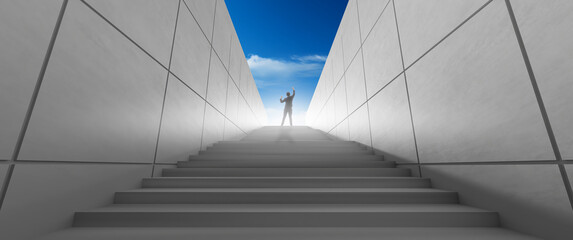 businessman celebrating raising arms on the top stairs with over sunlight.concept of leadership successful achievement with goal,winner,success,growth,achieve,up,win and objective target