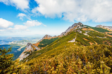 Mountain Tatras landscape. View from ridge of the Poland Tatras. Hiking from Kasprowy Wierch peak to Gievont peak . View on zakopane and Ticha valley.