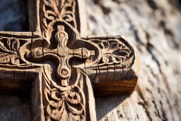 Wall Mural - Closeup of a rustic, weathered cross, its intricate carvings and imperfections adding character and depth to the image.