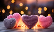 Love-filled evening, Knitted hearts and romantic bokeh at cozy windowsill