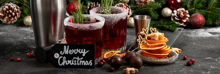 Wall Mural - Red christmas cocktail with cranberries in a glasses.