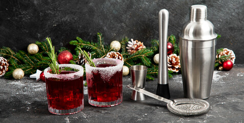 Wall Mural - Red christmas cocktail with cranberries in a glasses.