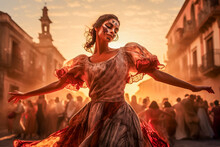 Woman At The Day Of The Dead Party In Mexico, Made Up With Her Face Painted As A Skull And Dressed In Mexican Clothing, In The Rustic Town Square Dancing Typical Cultural Dances, Backlit At Sunset