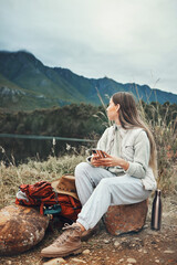 Canvas Print - Camping, phone and woman relax in nature with social media, freedom or outdoor peace. Hiking, break and female explorer with smartphone, app or chat while chilling at forest lake and enjoying scenery