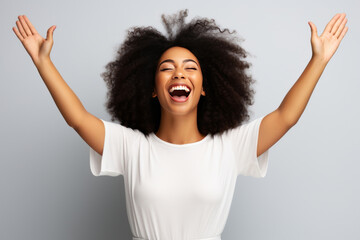 Happy young woman in a white empty T-shirt for advertising on a solid color background in studio