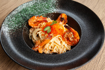 Wall Mural - Spaghetti with grilled shrimp, ebiko, and cream sauce