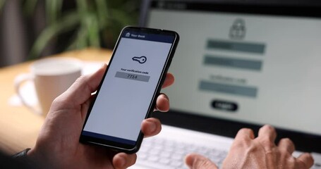 two-step authentication. verification code on smart phone screen for identity identification for online banking. cyber security technology