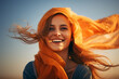 A woman in an orange headscarf smiles in the breeze created with generative ai
