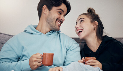 Poster - Couple, coffee and relax with smile, love and trust on sofa in living room of home or apartment with bonding. Tea, man and woman together with happiness for peace, romance and commitment on couch