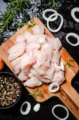 Canvas Print - Sliced chicken fillet. On cutting board.