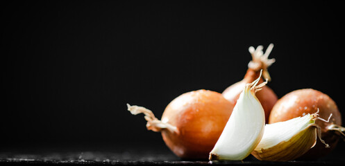 Wall Mural - Fresh onions . On table