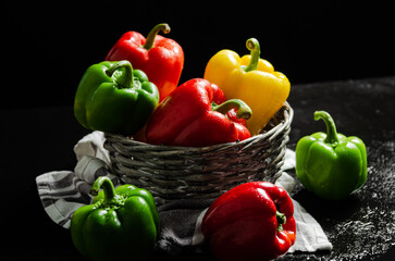 Wall Mural - Fresh sweet pepper. On black table.