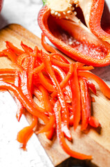 Canvas Print - Chopped sweet pepper. On white table.