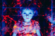 © XaMaps - Entrancing image of a child mesmerized by screen light.