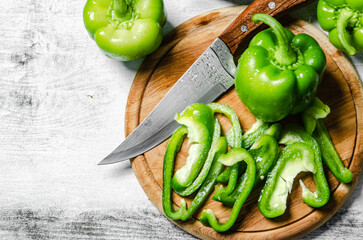 Sticker - Chopped sweet pepper. On white table.