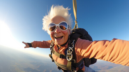 Happy old mature woman taking selfie picture while sky diving