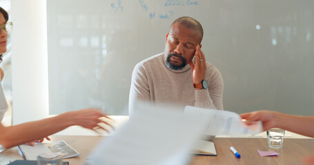 Poster - Tired, businessman and headache in meeting with paperwork, people and fatigue in office or conference room. Team, manager and employee with burnout, migraine or anxiety for documents and report