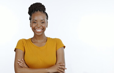 Poster - Portrait, happy woman and arms crossed in studio with mockup, confidence and good mood in Nigeria. Young african model smile with pride, face and personality isolated on white background space