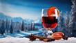 A glass of mulled wine on a winter mountain background