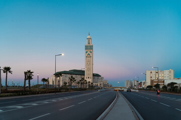 Wall Mural - view of Hassan II mosque from the street at sunset